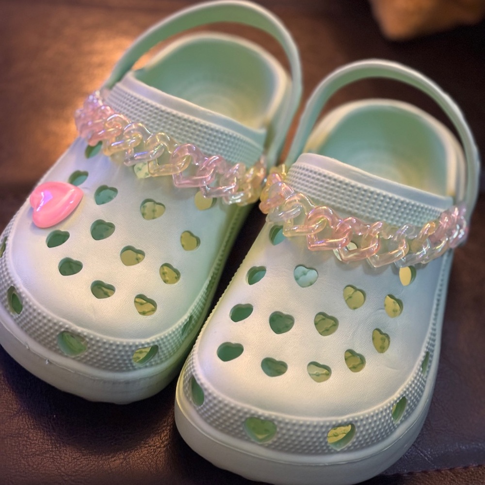 Never Worn Clog Sandals with Rotating Heel Strap. Pink chain and heart jibbitz.